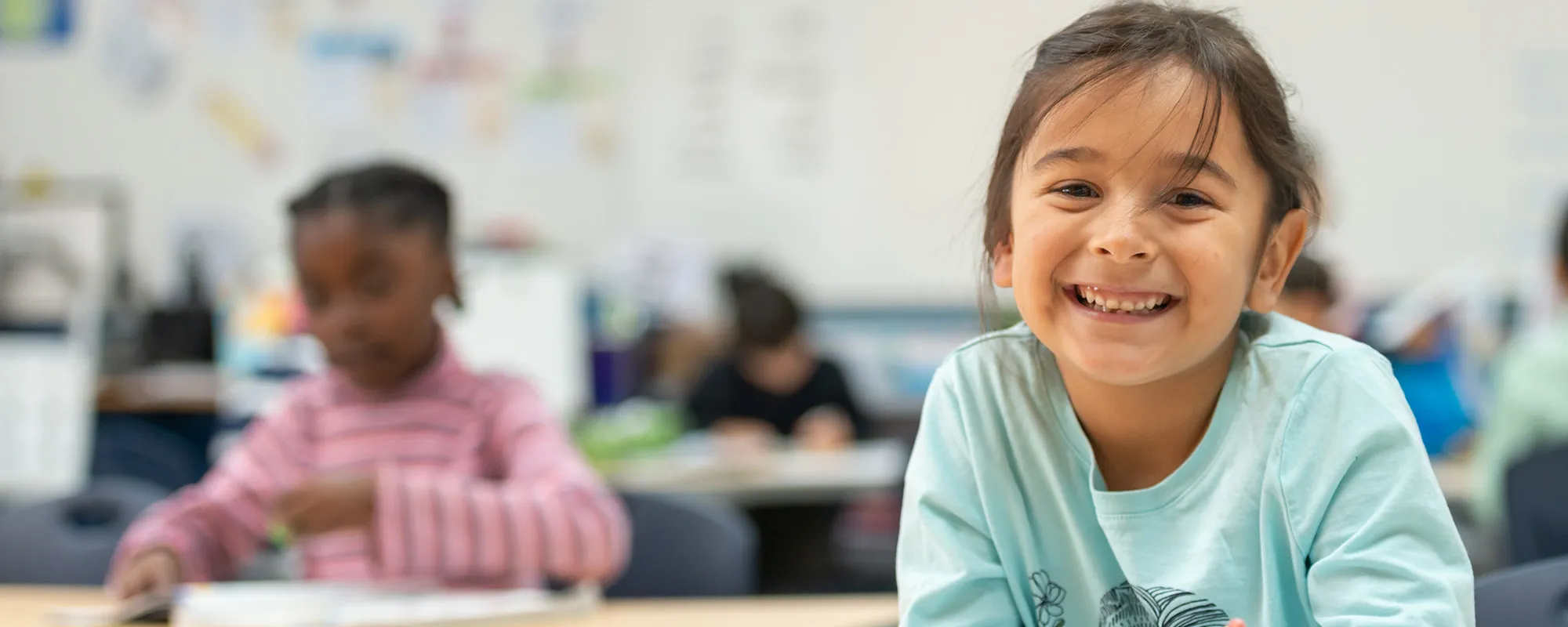 Girl smiling in classroom